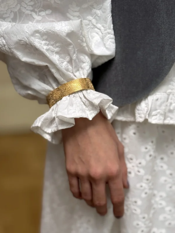 Gold-plated wide hard bracelet “Michel Lermantoff” with the engraving and texture